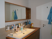 Spiegelschrank mit Spiegelschiebetür in Eiche massiv